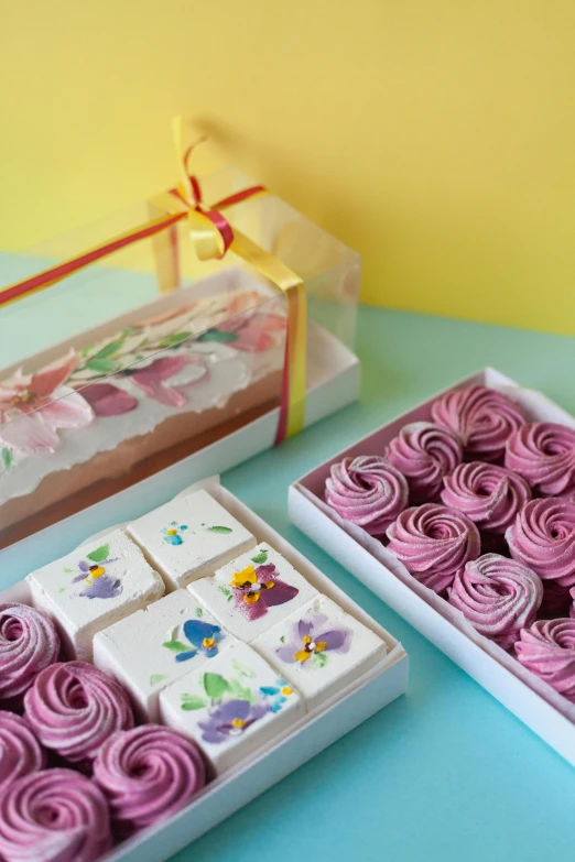 a cake box that has cupcakes inside of it