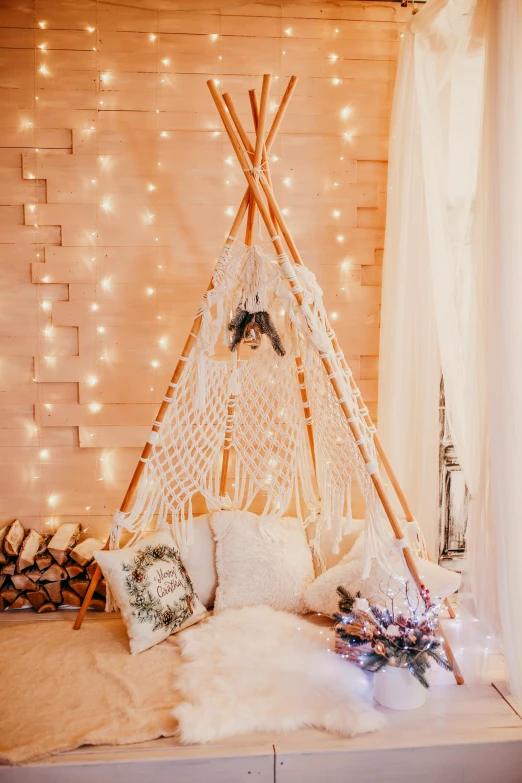 a room with some lights and a teepee net