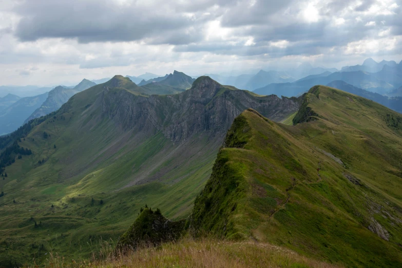 a scenic view looking down at the mountains