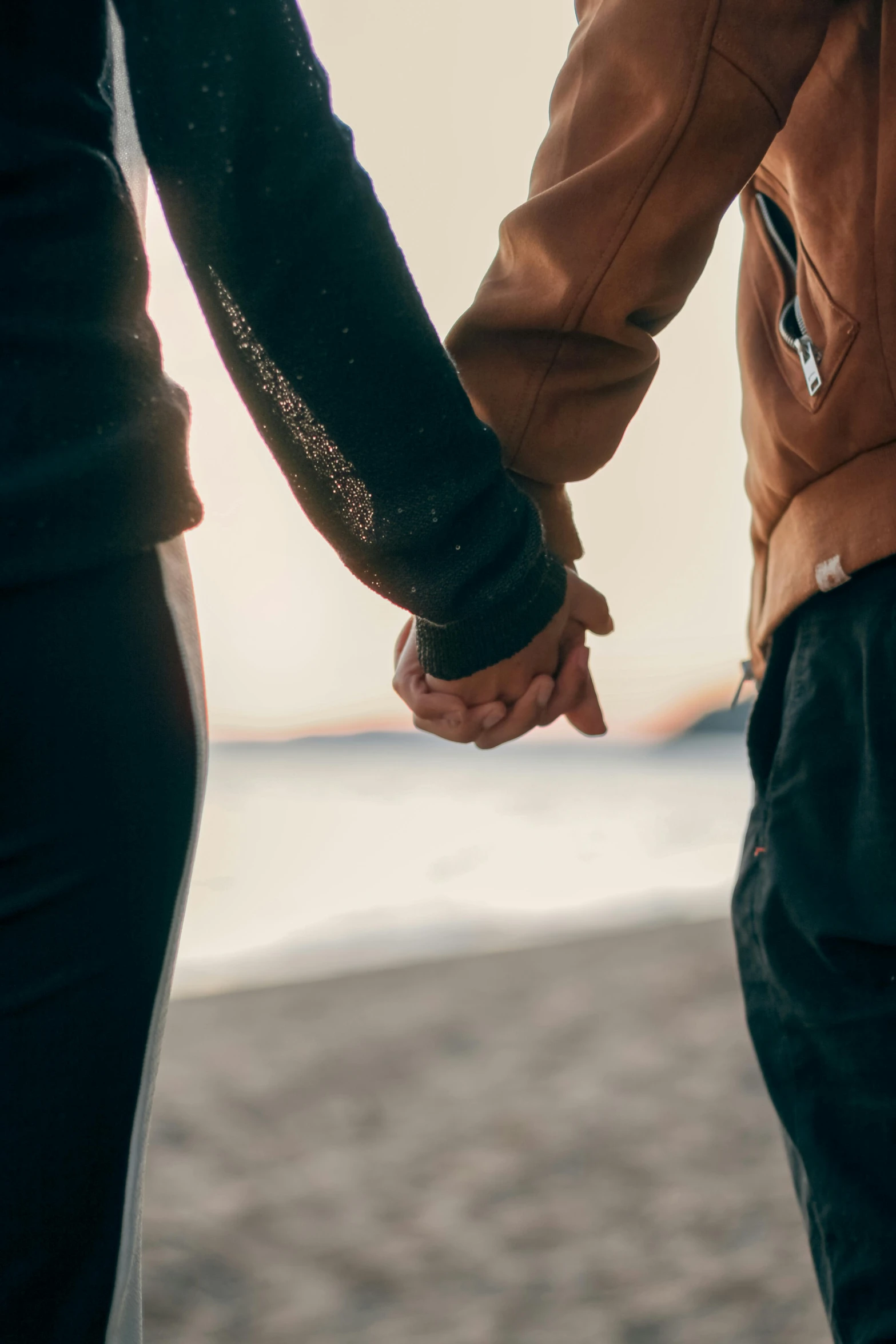 an image of two people holding hands