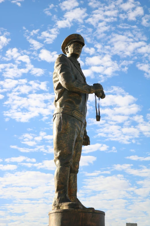 the statue of the man is wearing an army uniform