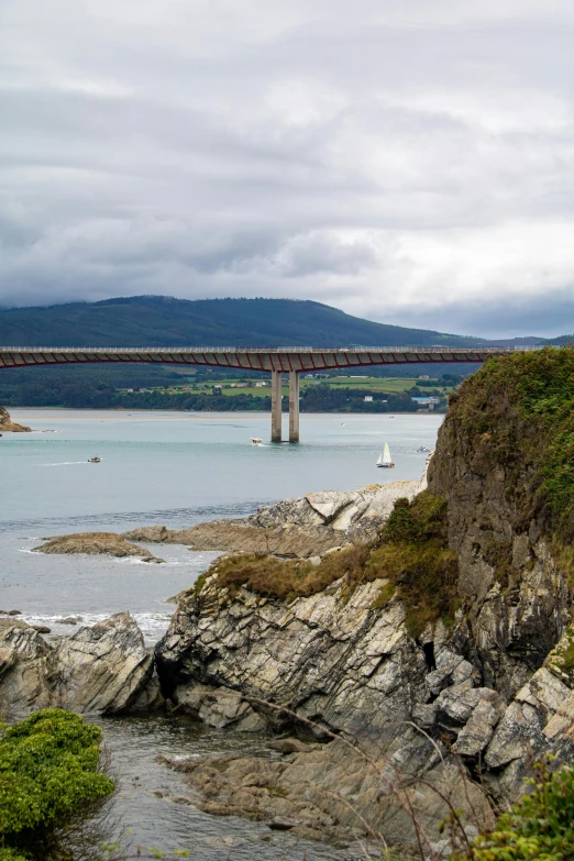 a large bridge spanning over the width of the water