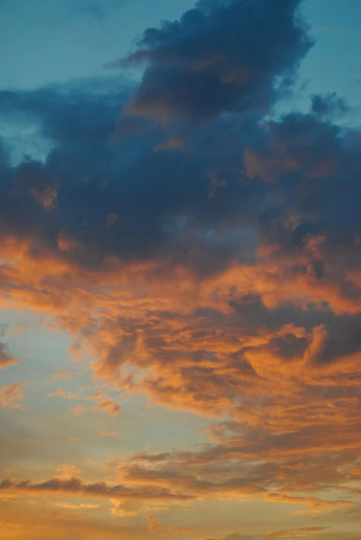 the airplane is flying by and at twilight