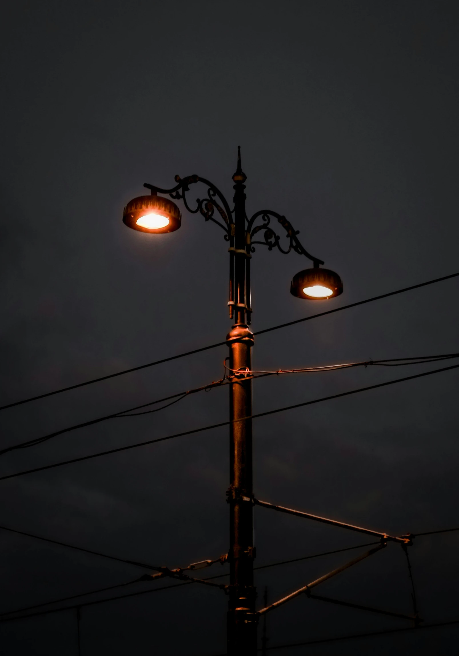 a street light in the dark and lit up at night