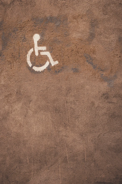 a handicapped parking spot with white markings on it