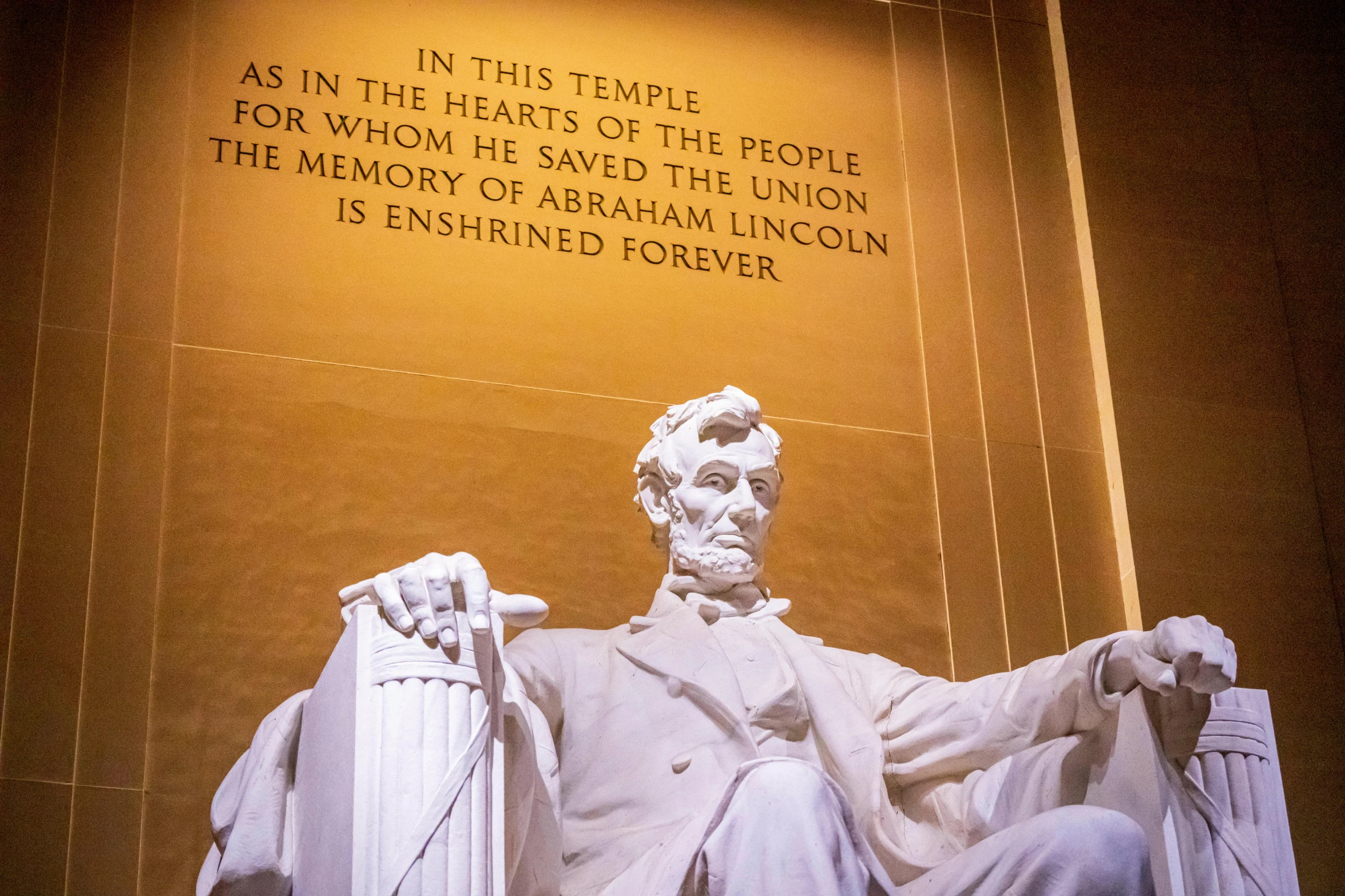 a lincoln memorial with some writing on it