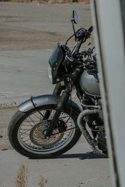 a motorbike is parked on the side of the road