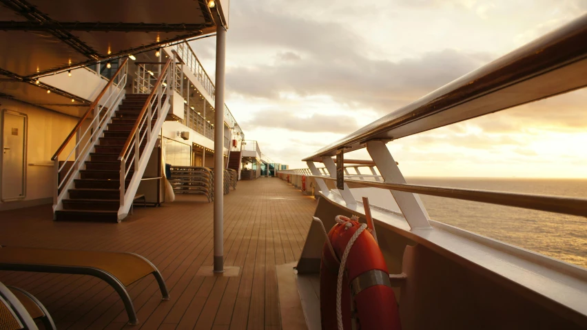 deck chair and railing on the deck of a cruise ship