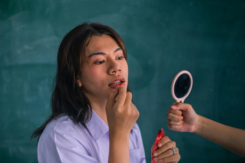 a girl brushes her teeth with her friend