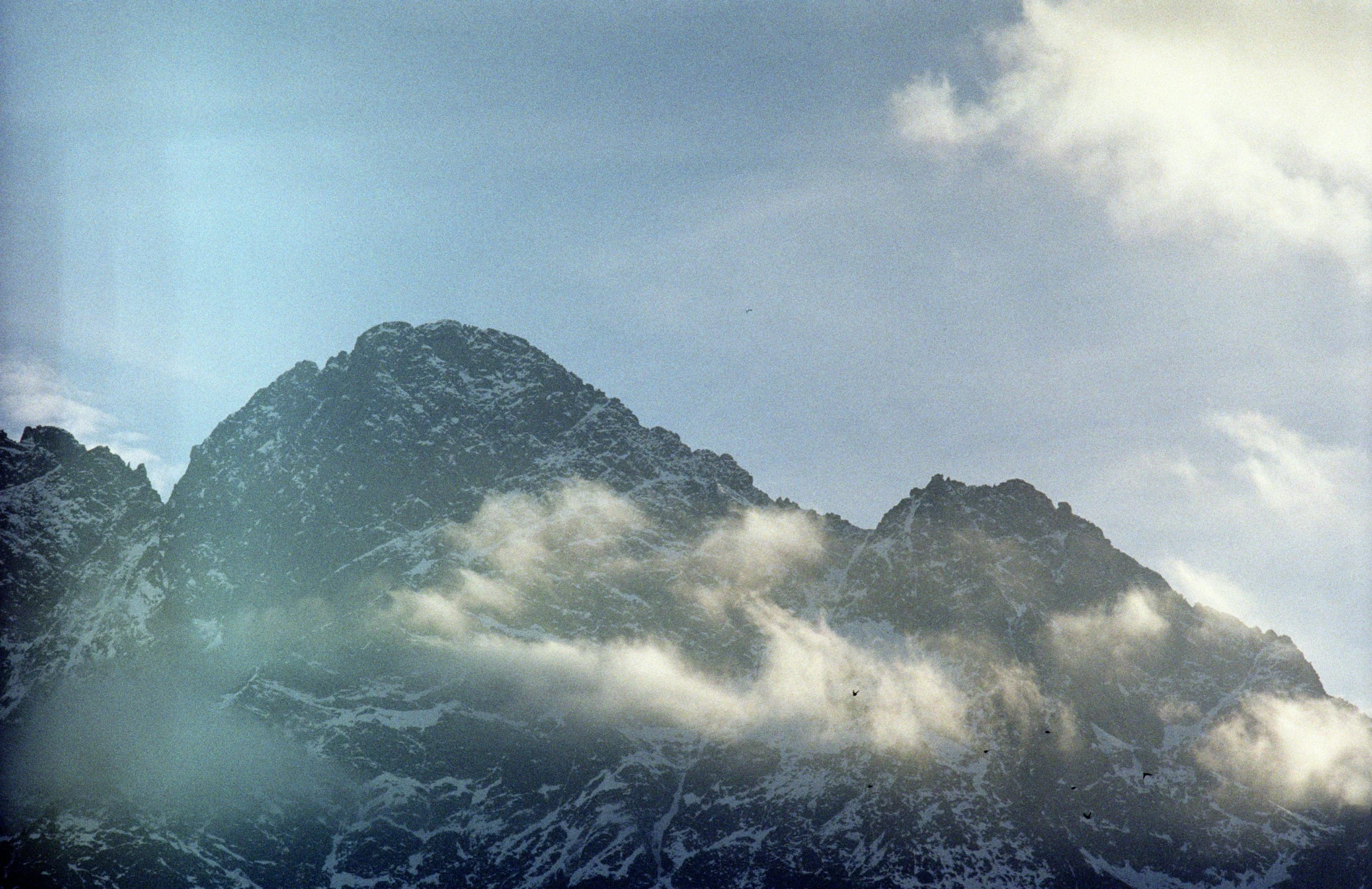 an image of snow covered mountains that is very high