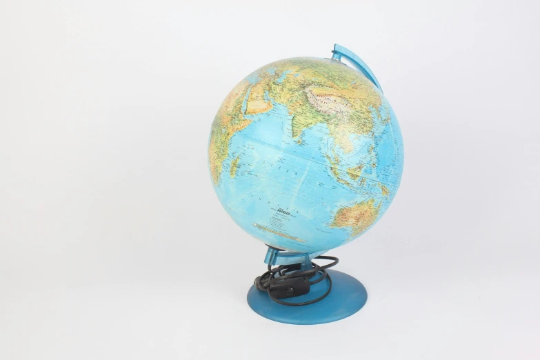 an earth globe with some sort of a camera in it