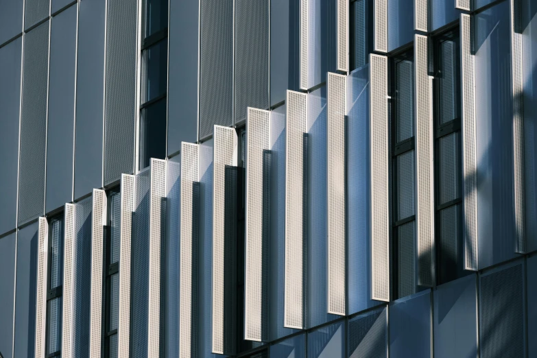 a side view of a building with some white stripes