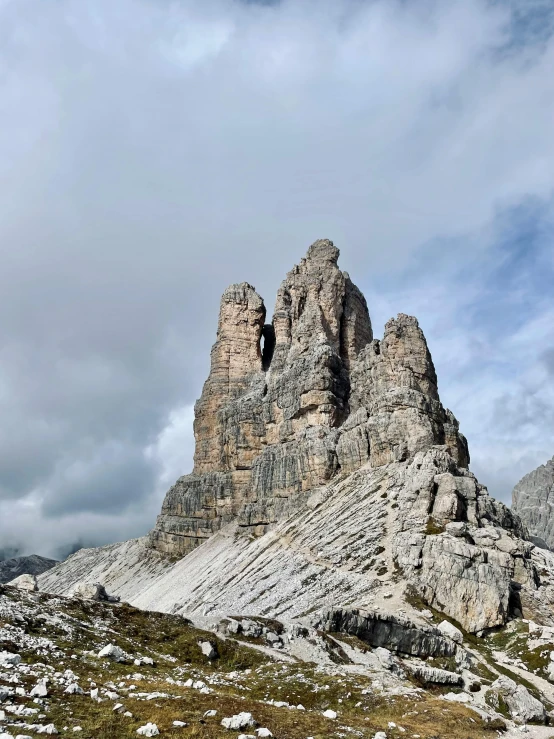 a mountain range with a very tall rock formation