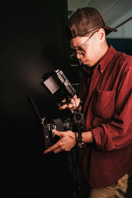 a man with a camera and a watch