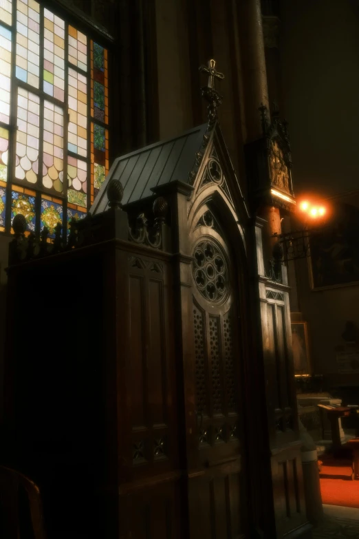 a clock in front of two stained glass windows