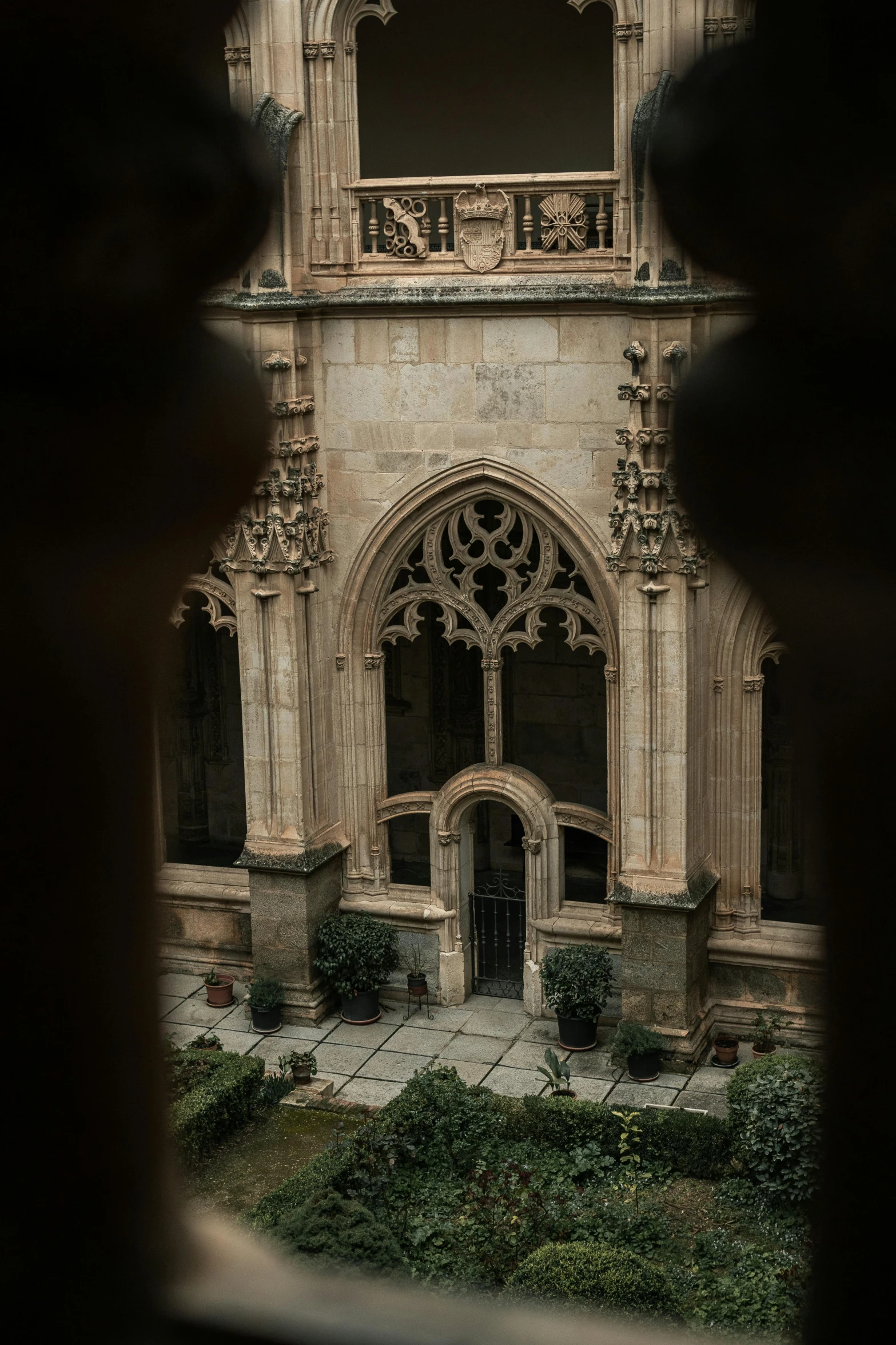 a view through a hole in a stone building