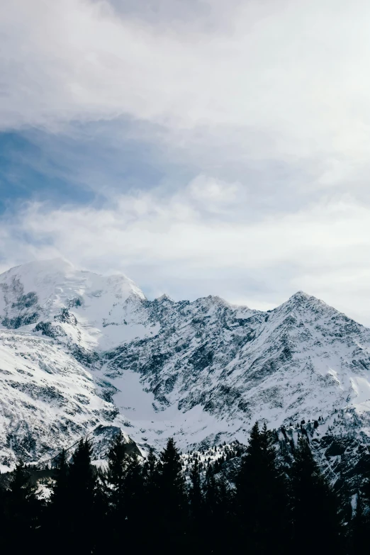 a large mountain covered in lots of snow