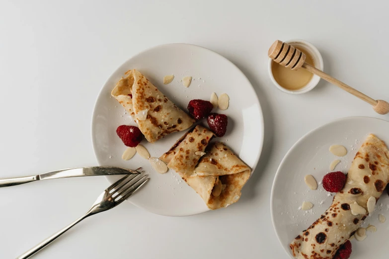 three small plates with food that include flatbreads