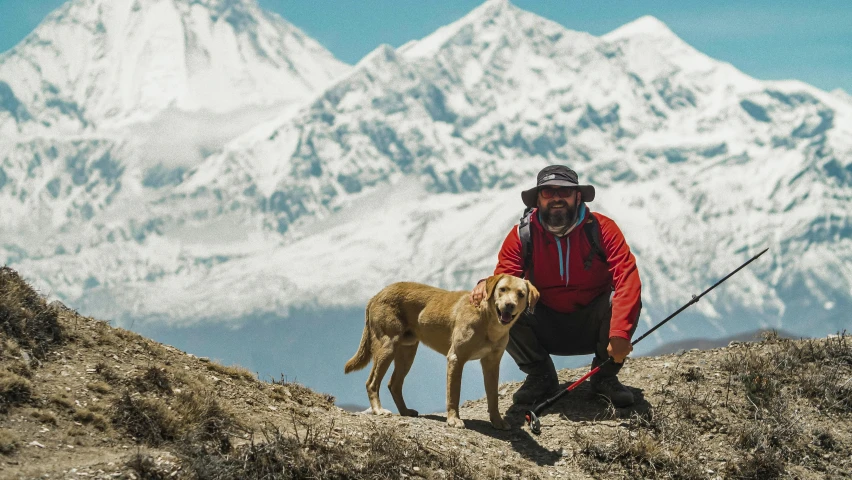 the dog and his handler are posing for the camera