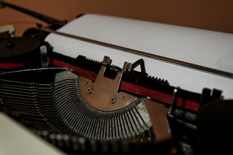 a closeup po of an old typewriter with the letter f