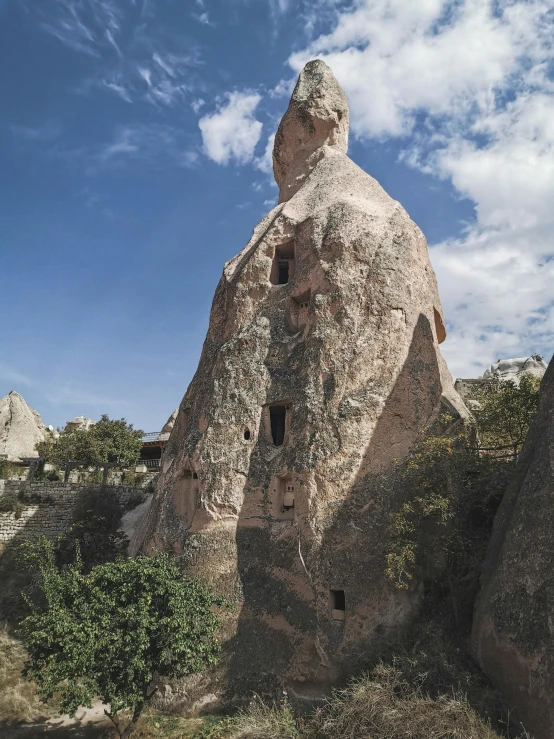 an interesting rock formation with small holes in the rock