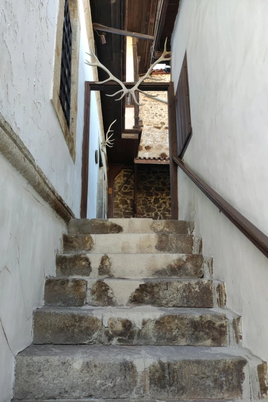 an old set of stairs with dirty steps