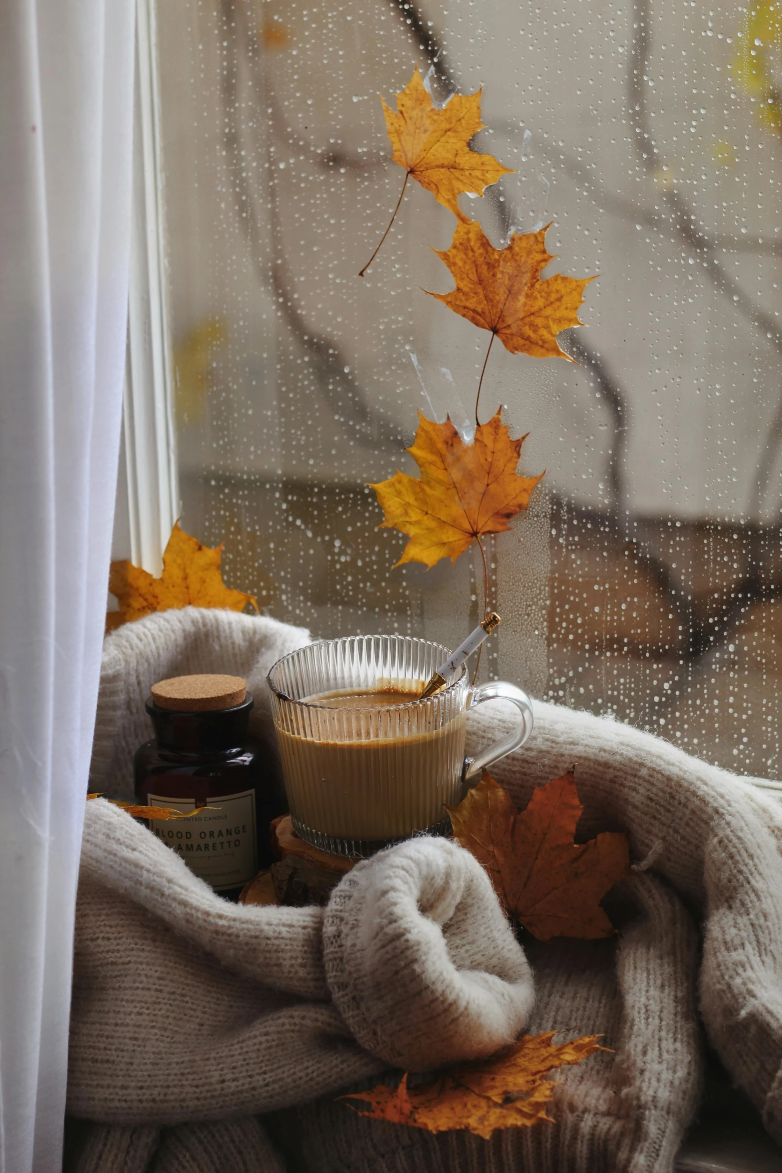 an image of someones winter outfit on the window