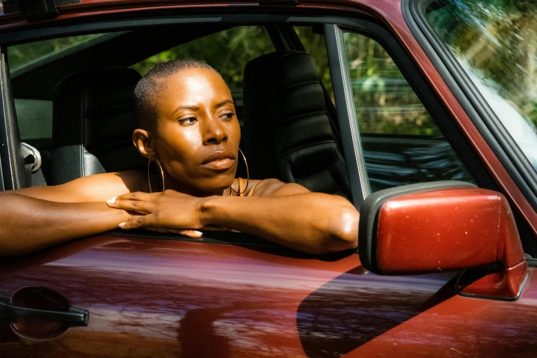 an image of a person sitting in the back seat