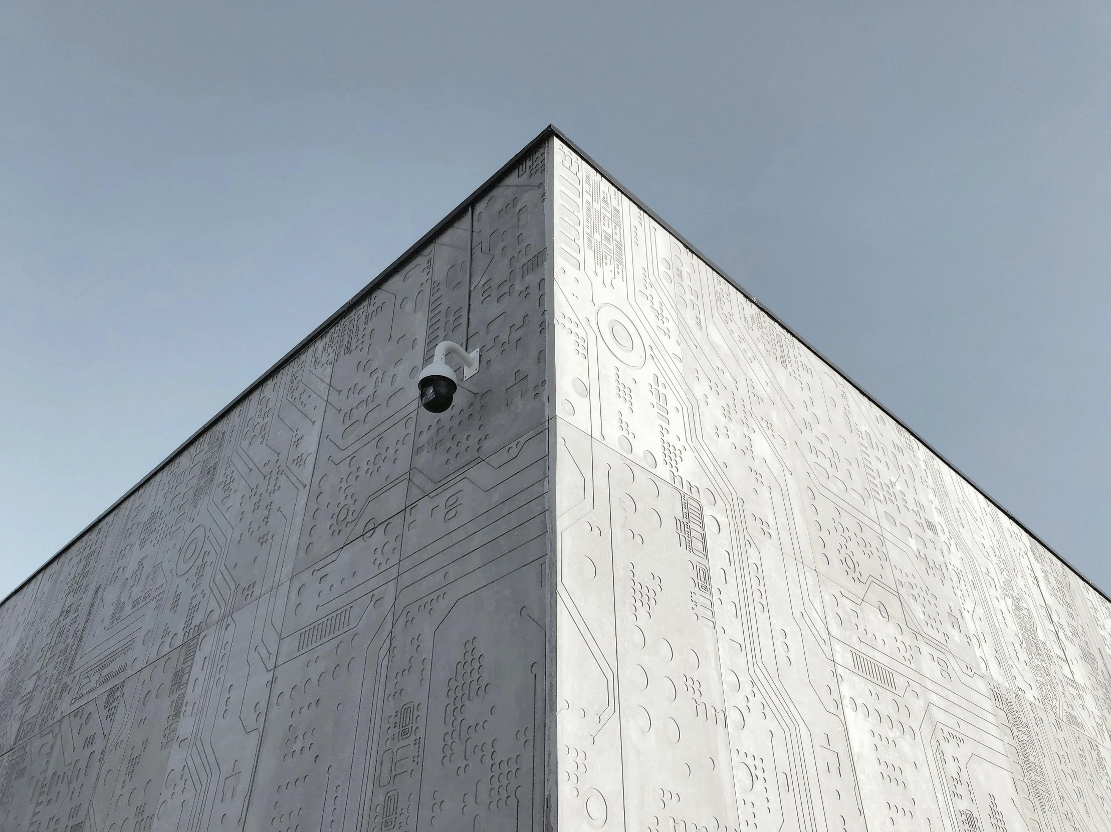 an image of a white building with rain drops