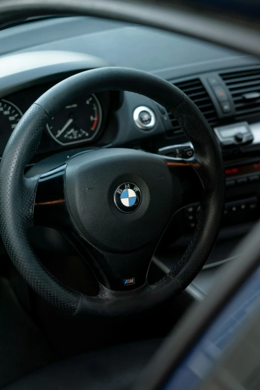 dashboard view of a bmw car with the instrument