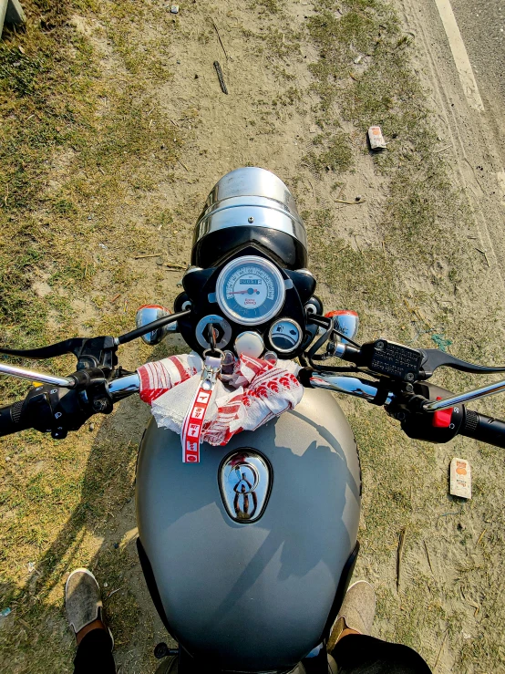 a close up view of a motorbike with a moped helmet