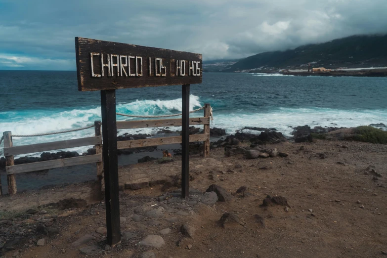 a sign on the shoreline points out where to go