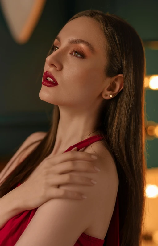 a girl with long hair and red lipstick