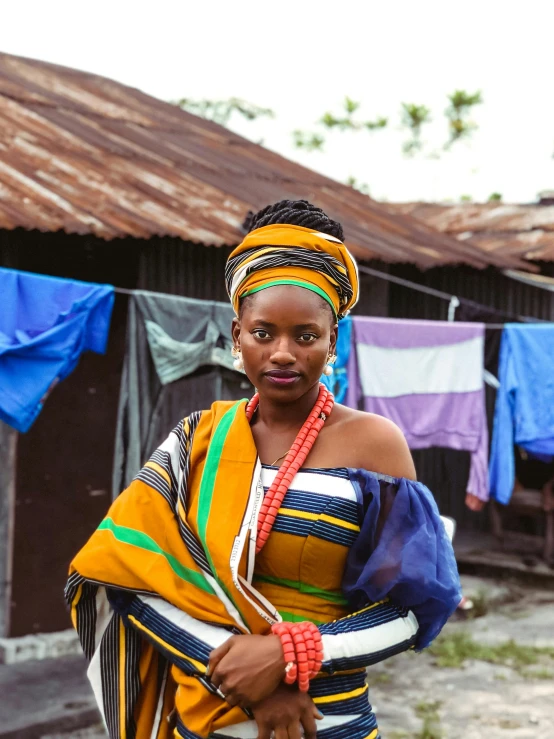 woman from the african country wearing a colorful wrap around her neck