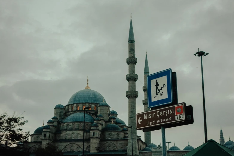 the big minalis behind the sign in a cloudy day