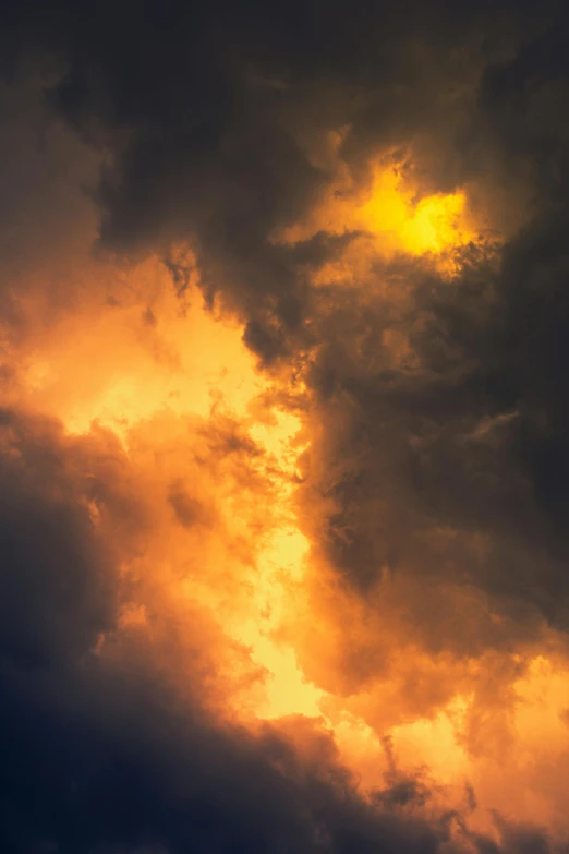 bright orange clouds that have the sky in the background