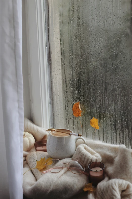 a picture of some items sitting on a table in front of the window