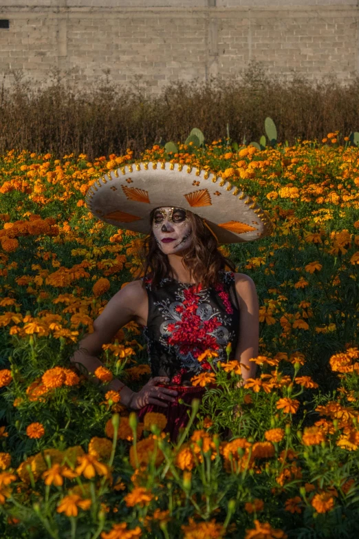 an woman wearing makeup, in a flowery field holding a parasol