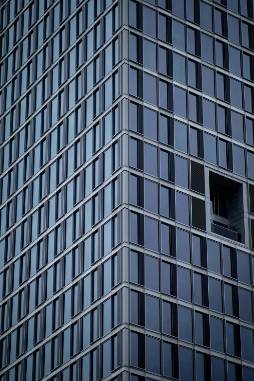 this glass - building is taller than it should be