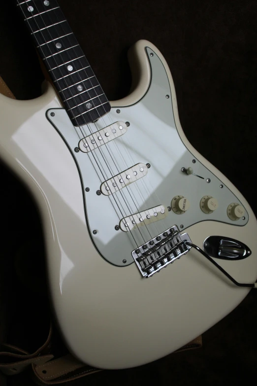 a fender guitar that is on display in a case