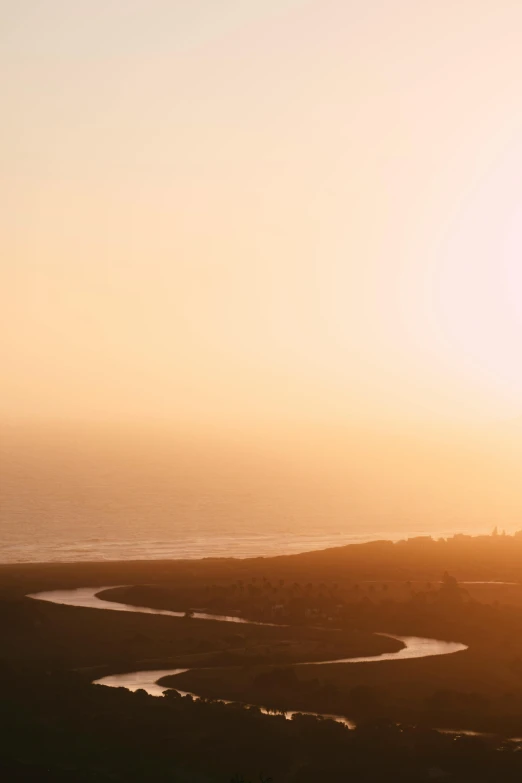 the view of the ocean and horizon during sunset