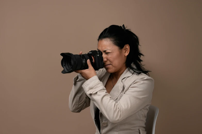 a woman takes a po with her camera