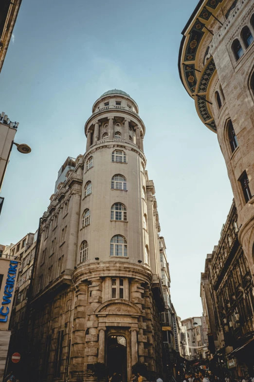 a group of people walking around in a city