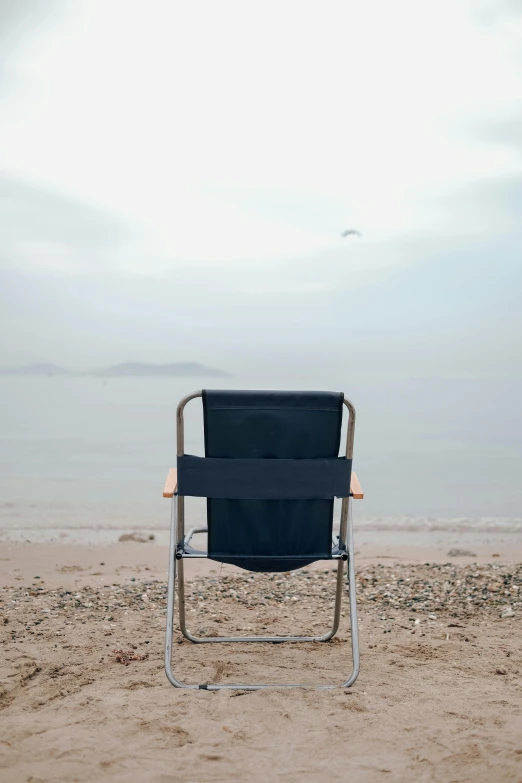 a empty beach chair on a nice day