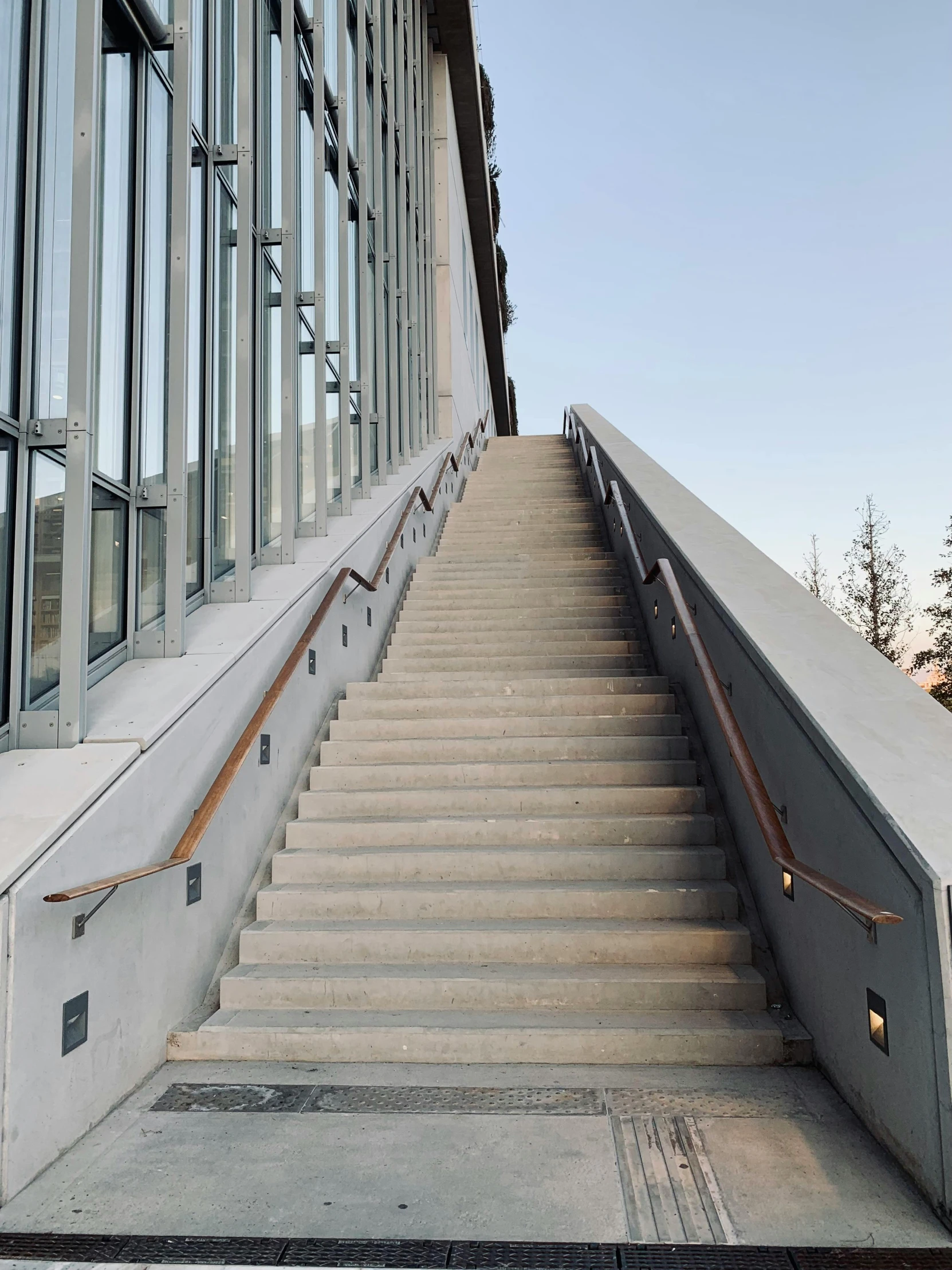 a stairway going up into a large building