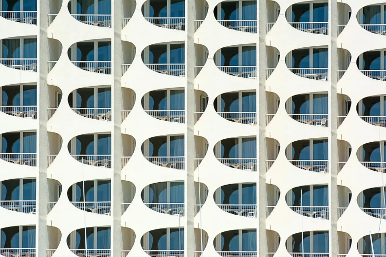 a very tall building with some balconies on the side