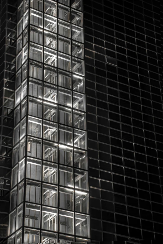 a very tall building surrounded by other high rise buildings