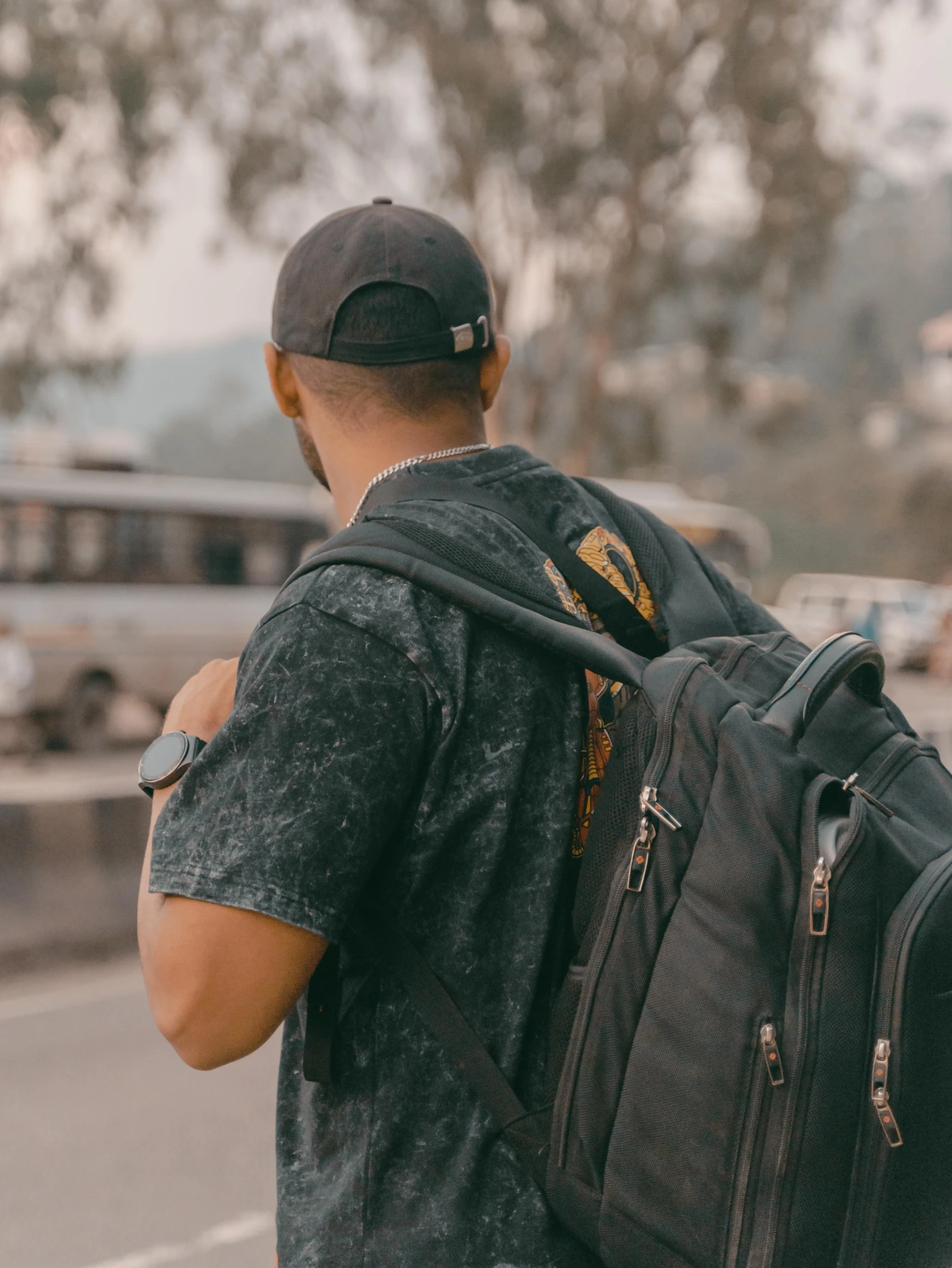 a man is walking down the street with a backpack