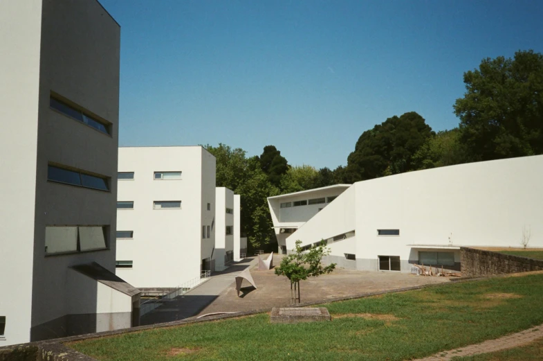the courtyard and the exterior of the white building