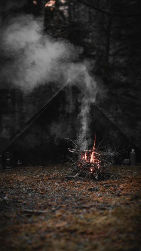 a dark image of the outside of a tent